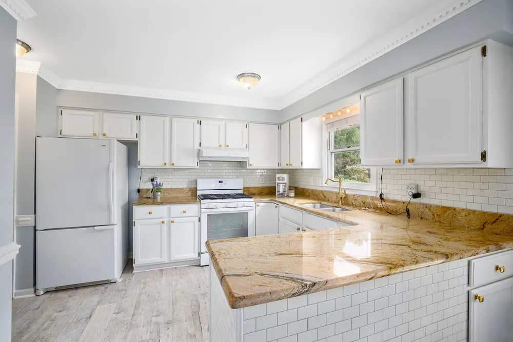 Countertops — bright kitchen white cabinets marble