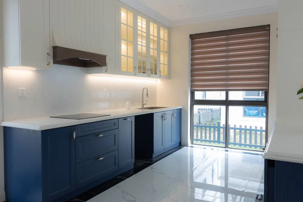 Countertops — bright modern kitchen blue cabinetry