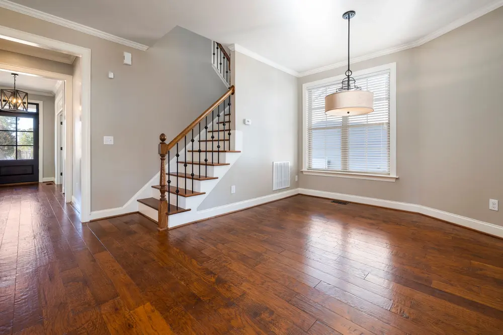 Hardwood flooring — bright airy room staircase — flooring installed in Fullerton, CA