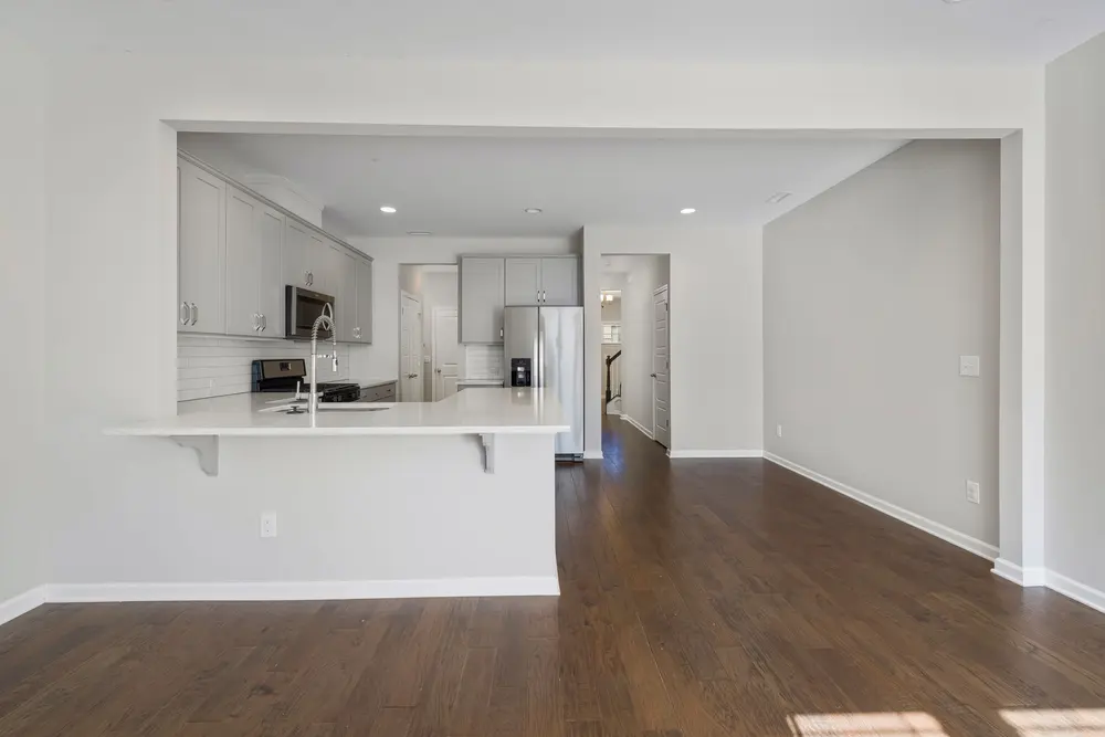 Hardwood flooring — bright empty modern kitchen — flooring installed in Cerritos, CA
