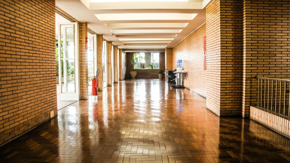 Refinished hardwood flooring — empty brick corridor s o paulo polished