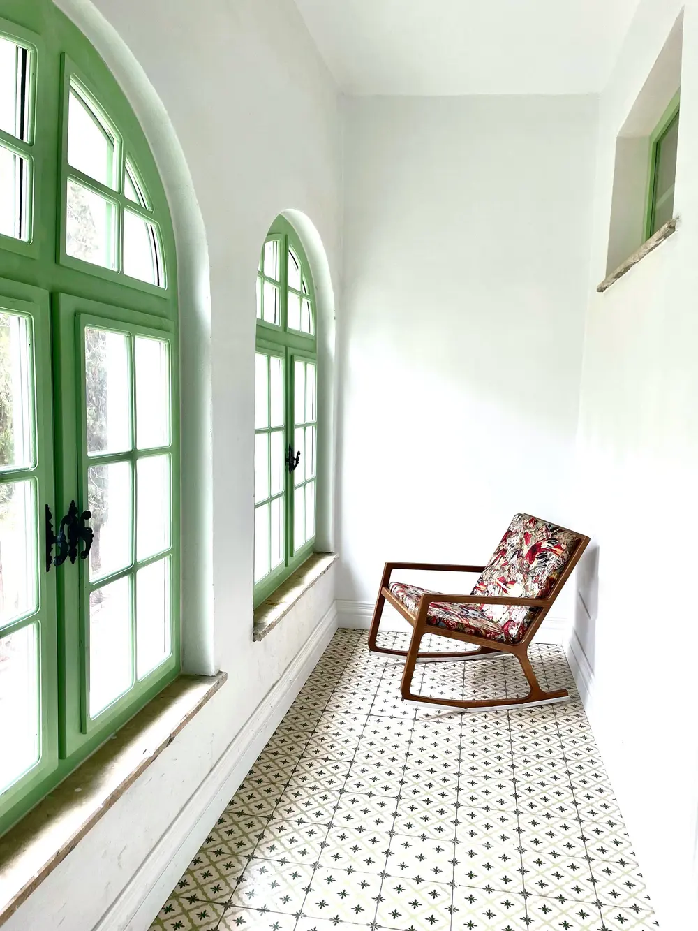 Tile flooring — bright corridor green arched windows patterned — near Seal Beach, CA