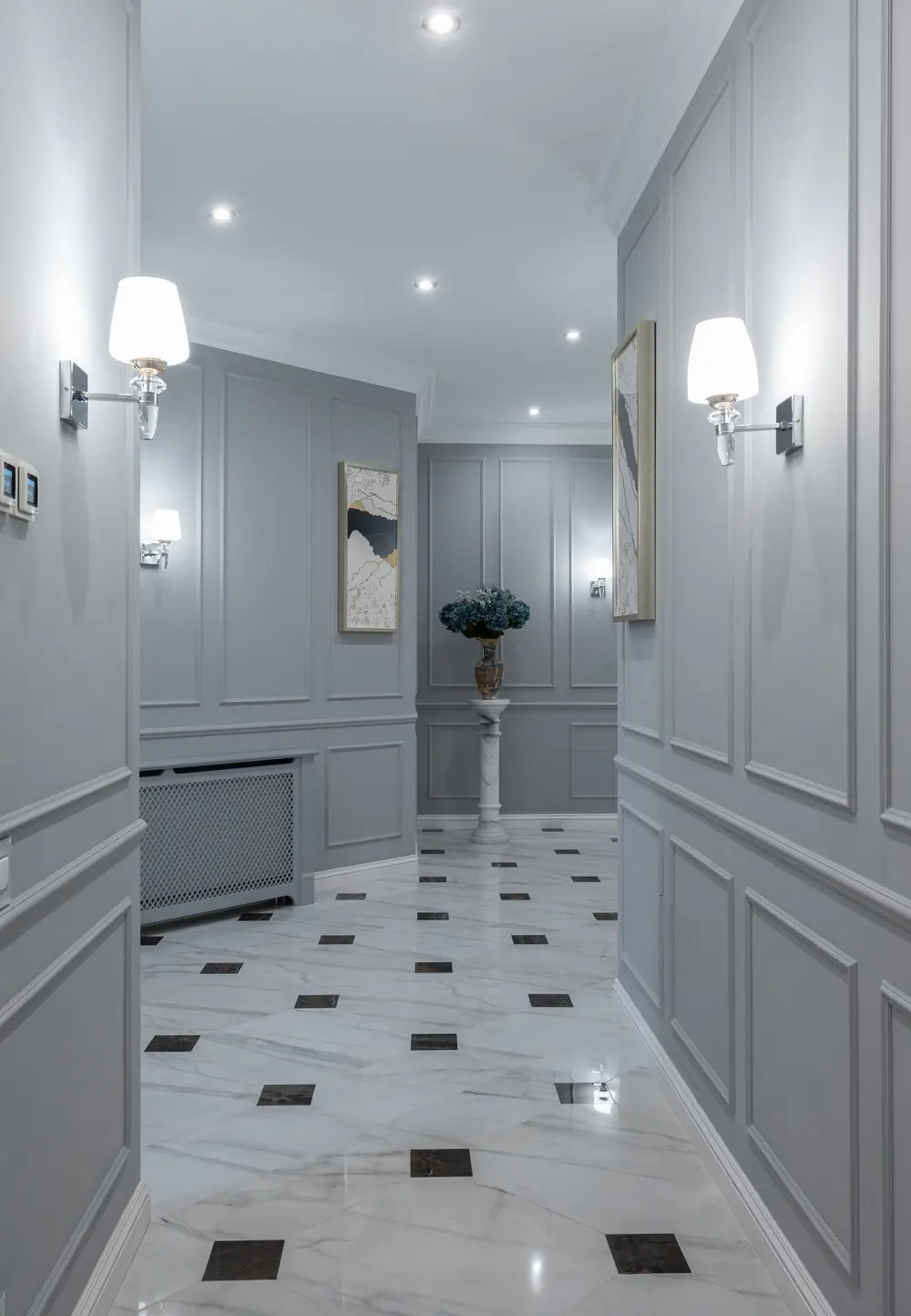 Tile flooring — elegant shining lamps paintings hanging gray walls — near Irvine, CA
